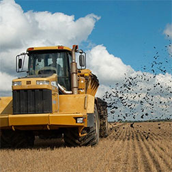 farm machinery distributing soil amendments