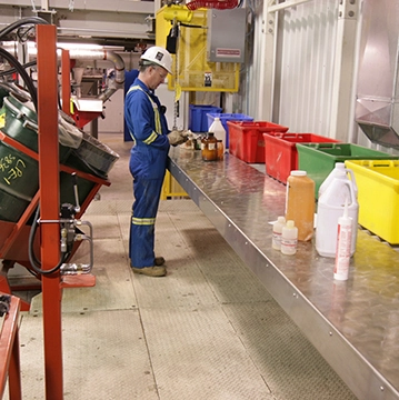 Person performing tests on recycled materials