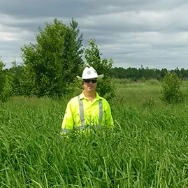 Person in reclaimed wetlands